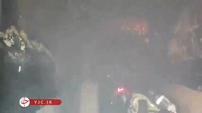آتش سوزی کارگاه تولید سپر خودرو در تهران + فیلم