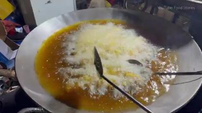 (ویدئو) غذای خیابانی در پاکستان؛ پخت ماهی ماسالا به روشی متفاوت در کراچی