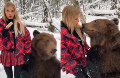 (ویدئو) دوستی عجیب دختر جوان با یک خرس!