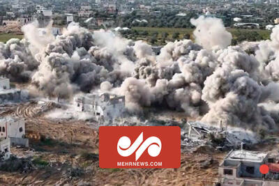 لحظه انفجار منازل مسکونی در عبسان الجدید غزه به دست صهیونیستها