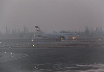 کمبود خدمات در فرودگاه مشهد/ سرگردانی مسافران در روز برفی مشهد - تسنیم