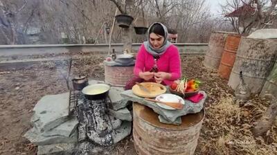 پخت نان و املت زغالی به روش متفاوت یک بانوی جوان شمالی (فیلم)