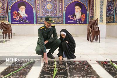 آیین مهمانی لاله‌ها در گلزار شهدای بجنورد