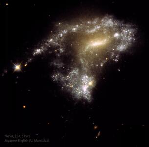 تصویر روز ناسا: ستارگان حاصل از ادغام کهکشان AM1054-325