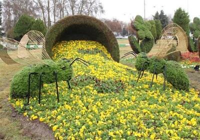 مهیا شدن مشهد برای استقبال از بهار1403/ جانمایی 1100 نماد گل در مشهد - تسنیم