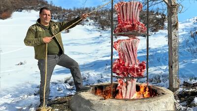 (ویدئو) فرآیند تماشایی کباب کردن 9 کیلو دنده گاو در تنور به سبک آشپز آذربایجانی