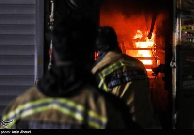 آخرین وضعیت آتش‌سوزی ساختمان 5طبقه در خیابان ولی‌عصر - تسنیم