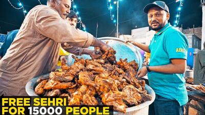 فیلم/ نحوه پخت 15 هزار پرس چلو مرغ توسط آشپزهای پاکستانی برای سحری ماه رمضان
