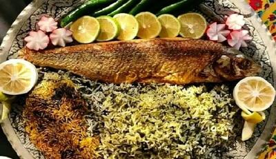 طرز تهیه سبزی پلو ماهی در فر+فیلم/ غذای شب یلدا را با سبک رژیمی طبخ کنید
