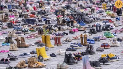 (تصاویر) ۱۴ هزار کفش به یاد کودکان قربانی جنگ غزه