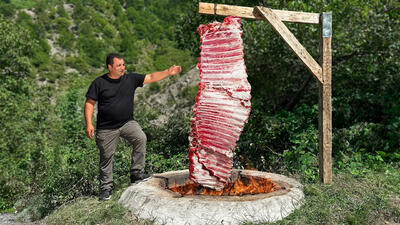 (ویدئو) نحوه پخت 9 کیلو دنده گاو در تنور به سبک آشپز معروف آذربایجانی