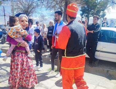 اجرای برنامه نوروزخوانی و جنگ شادی در پارک ملت اسدآباد