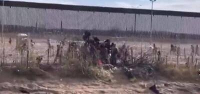 تصاویری از هجوم مهاجران غیرقانونی به مرزهای آمریکا