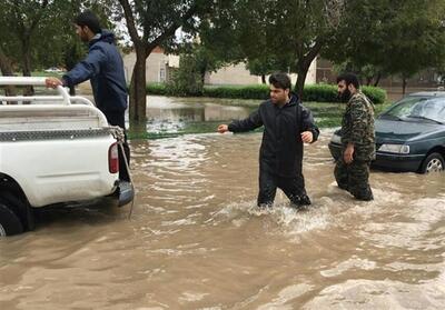 امداد‌رسانی جهادی بسیجیان دزفول به مردم در پی بارندگی - تسنیم