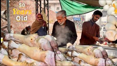 (ویدئو) غذای خیابانی در پاکستان؛ فرآیند طبخ خورشت پاچه گاو