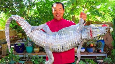 پخت تمساح 35 کیلوگرمی توسط آشپز روستایی چینی (فیلم)