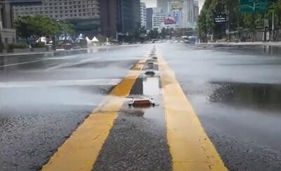 نصب دستگاه‌های آب پاشی در جاده‌های کره جنوبی (فیلم)