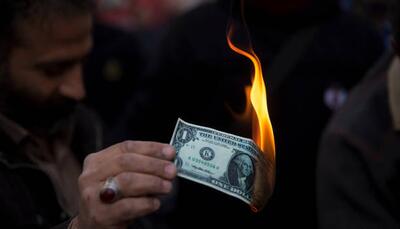 تنش‌های سیاسی؛ آتشی که به جان بازار ارز انداخته است/ دلار با ادامه تورم ۵۰ درصدی به این عدد می‌رسد | اقتصاد24