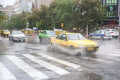 یک روز بارانی در شهر توپ آغاج و آبگرفتگی برخی معابر این شهر