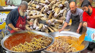 (ویدئو) غذای خیابانی محبوب در پاکستان؛ طبخ غذا با  300 پاچه بره و گوسفند