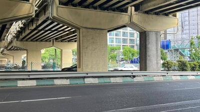 شهرداری تهران: نگرانی و شائبه‌ای درباره ایمنی سازه پل تقاطع مدرس - میرداماد وجود ندارد / پوشش الحاقی یکی از پایه‌های پل آسیب دیده بود که این پوشش از پل جدا شد