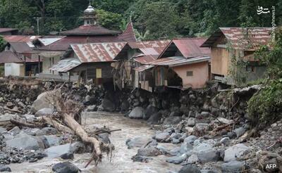عکس/ طوفان و رانش زمین در اندونزی