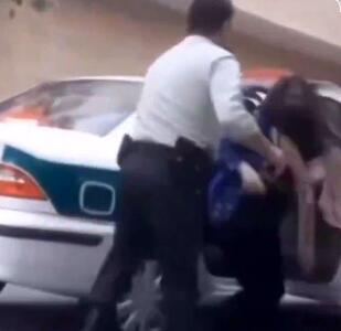 بازداشت پلیسی که زنی بی‌حجاب را کتک می‌زد