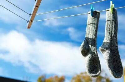 ابتکار خنده دار پسر ایرانی در خشک کردن جوراب مرزهای خلاقیت را جابه جا کرد/ عکس