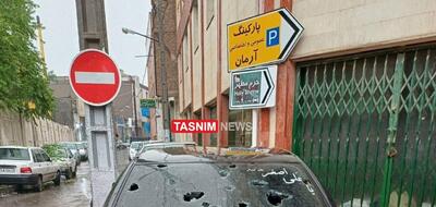 عکس/ تگرگ شیشه خودروها را در مشهد شکست | اقتصاد24