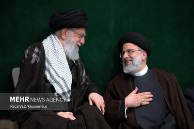 شهید حجت‌الاسلام رئیسی در کنار رهبر معظم انقلاب اسلامی