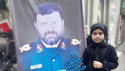 تشییع پیکر شهید موسوی «سرتیم حفاظت رئیس‌جمهور» مقابل منزلش در تهران (فیلم)