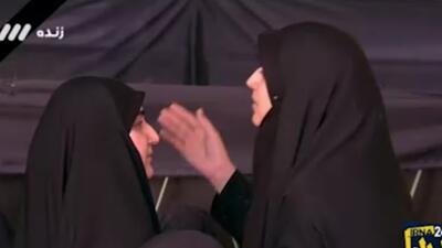 ویدیو / دختر رئیسی و سردار سلیمانی در مراسم تشییع رییس‌جمهور