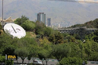 تغییر بزرگ در ابرساعت شهر تهران/ رئیسی و سردار سلیمانی در کنار هم + عکس