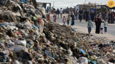 (تصاویر) انباشت زباله و فاضلاب ساکنان غزه را تهدید می‌کند