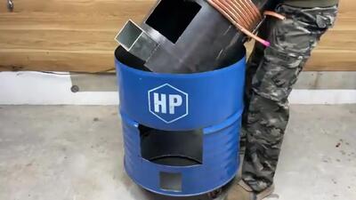 (ویدئو) نحوه ساخت اجاق- بخاری کاربردی با بشکه و سیلندر گاز فلزی قدیمی
