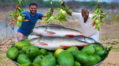 (ویدئو) نحوه پخت ماهی با انبه به روش دو آشپز روستایی هندی