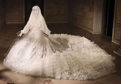 سنگین ترین لباس عروس دنیا / باورنکردنی است این لباس پارچه هم ندارد ! +عکس