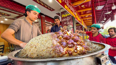 (ویدئو) غذای خیابانی در پاکستان؛ پخت 80 کیلو کابلی پلو با گوشت گاو