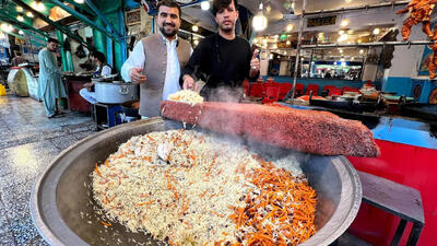 (ویدئو) غذای خیابانی در پاکستان؛ پخت 65 کیلو کابلی پلو با گوشت در لاهور