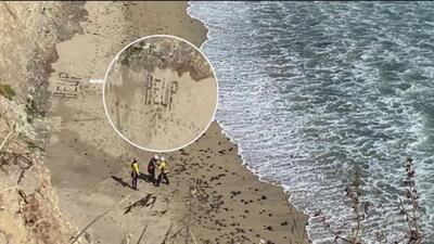 (ویدئو) نجات یک موج‌سوار پس از نوشتن کلمه «کمک» روی شن‌ها
