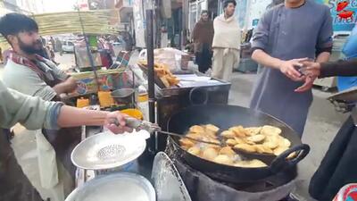 (ویدئو) غذای خیابانی در افغانستان؛ از پخت نان قندی و سیب زمینی تا سمبوسه