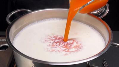 نحوه تهیه پنیر آلمانی خوشمزه با شیر و آب هویج در خانه (فیلم)