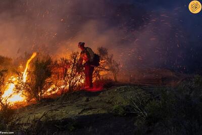 (تصاویر) مبارزه آتش‌نشانان با آتش‌سوزی جنگل‌های کالیفرنیا