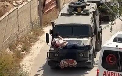 فیلم/ بستن جوان فلسطینی به عنوان سپر انسانی بر روی خودرو در جنین