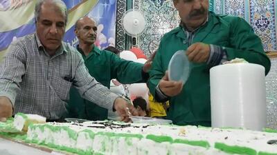 پخت و توزیع کیک ۱۲ متری در روستای قهساره + فیلم