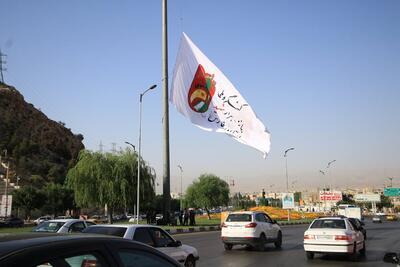 پرچم دومین کنگره پانزده هزار شهید فارس برافراشته شد