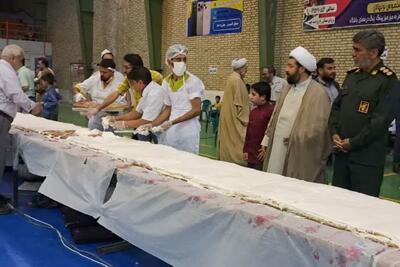 کیک ۱۱۰ متری به مناسبت عید غدیر در تربت جام پخت شد