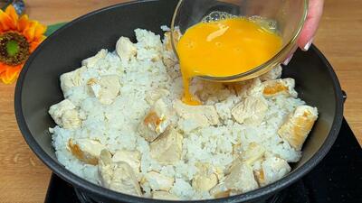 نحوه پخت یک غذا با فیله مرغ، تخم مرغ و برنج به سبک اسپانیایی‌ها (فیلم)