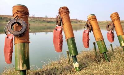 روش جالبی برای ماهیگیری با کمک چوب بامبو (فیلم)