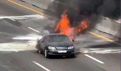 (ویدئو) آتش گرفتن یک خودروی ماکسیما در بزرگراه آزادگان